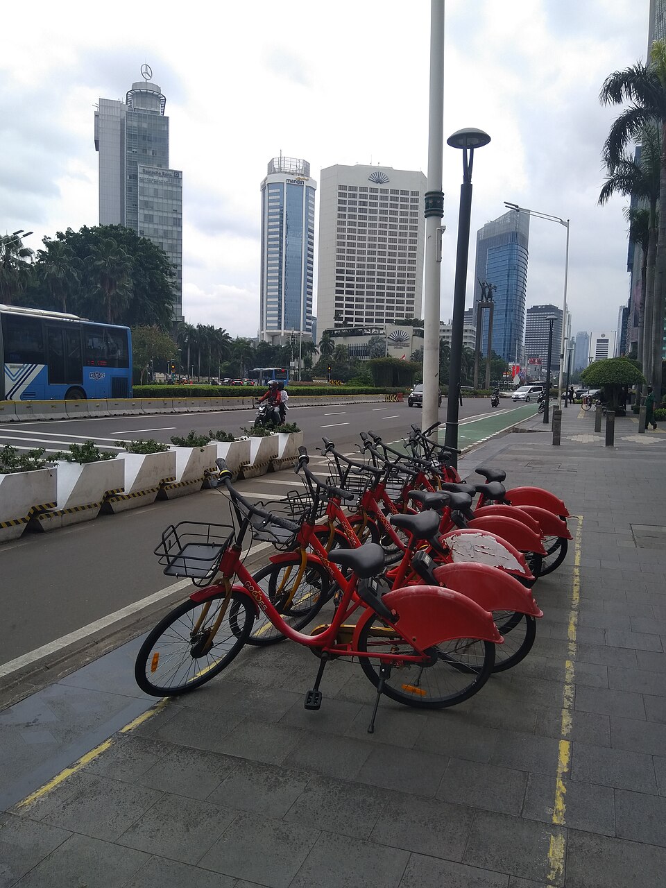 Bike-sharing docking point in a city plaza